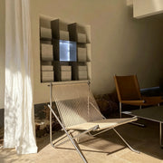 Modern woven folding chair, minimalist outdoor indoor lounge seat, curated unique home furniture