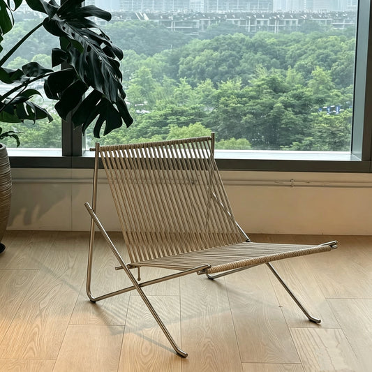 Woven folding leisure chair, minimalist designer home furniture for indoor space