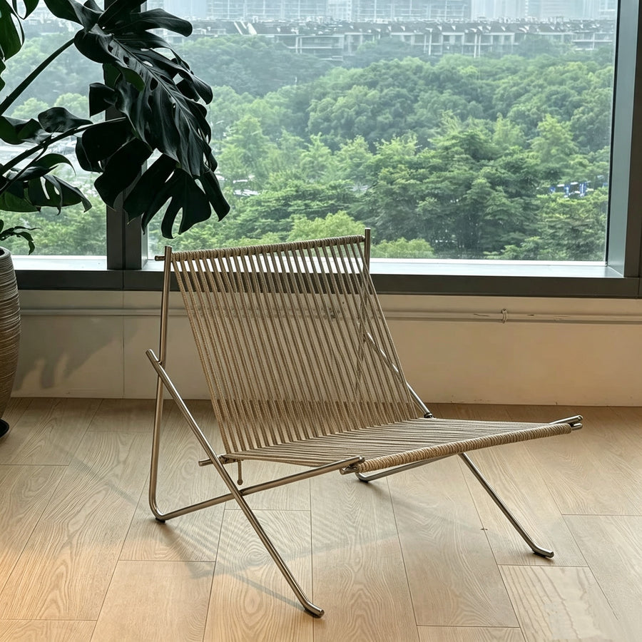 Woven folding leisure chair, minimalist designer home furniture for indoor space