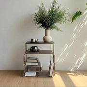 304 stainless steel wire-grid side table with built-in magazine rack, styled with books and a plant