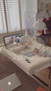 White retro-futurist vanity desk with built-in mirror tray, storage channel and pen slots